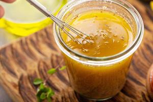 Homemade vinaigrette salad dressing photo