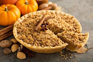 Traditional pumpkin pie with crumb topping photo