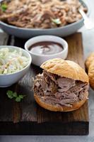 Pulled pork sandwich with cole slaw photo