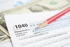 Tax form 1040 U.S. Individual Income Tax Return, business finance concept. photo