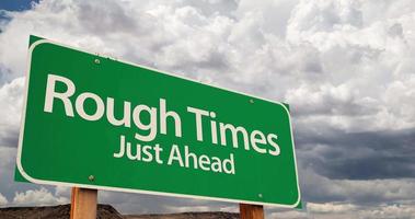 4K Time lapse Rough Times Green Road Sign and Stormy Cumulus Clouds and Rain. video