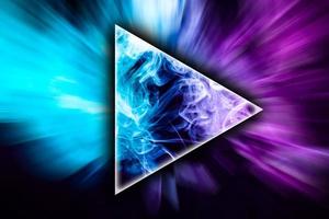 Fog colored with bright pink and blue gel in the shape of a triangle on dark background photo