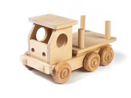 Photo of a wooden car truck made of beech on a white isolated background