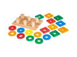 sorter with small wooden details in the form of geometric shapes photo