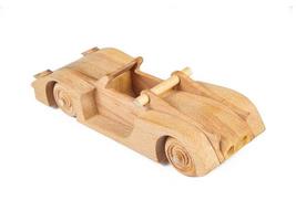 Toy made of wood on a white isolated background photo