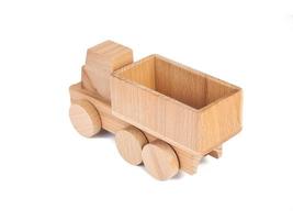 Photo of a wooden car truck made of beech on a white isolated background