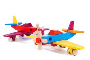 Toy wood retro planes on a white background isolated photo