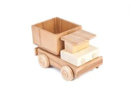 Photo of a wooden car truck made of beech on a white isolated background