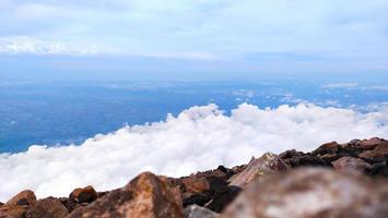 Photo of thick white clouds taken from the top of the mountain