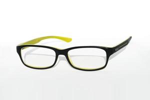 Yellow black glasses on a white background photo