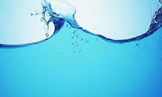 salpicaduras de agua azul y burbujas foto