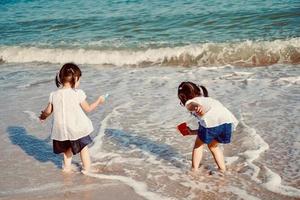 happy family on the beach photo