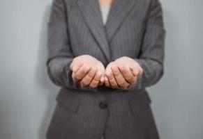 woman doing hand holding something photo