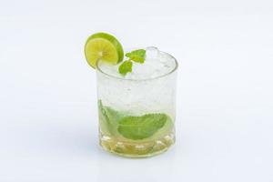 Lemon soda. Beverage for summer with brick wall background. photo