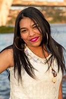 Lovely young Brazilian girl with a beautiful smile at the Park photo