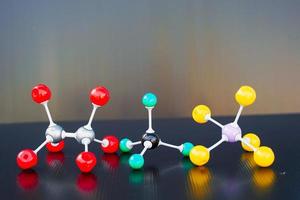 Simulate Shape of covalent molecules on black background. Soft and selective focus. photo