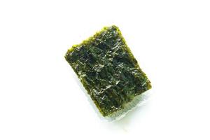 nori seaweed isolated on white background. Japanese food nori. Dry seaweed sheets. photo