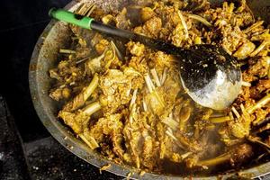 tengkleng kambing or goat tengkleng is a kind of soup with the main ingredient of goat bones. tengkleng like curry with goat bone material photo