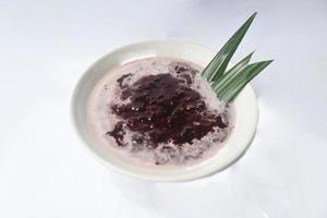 black sticky rice porridge in a bowl. bubur ketan hitam photo