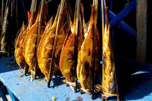 grilled fish, grilled fish nile Tilapia grilled on hot charcoal photo