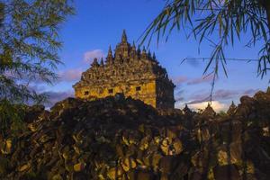 Candi Plaosan, a Buddhist temple located in Klaten Central Java, Indonesia, with a background of Mount Merapi photo