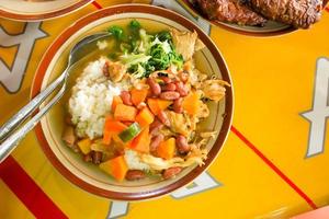 Sop Senerek or Red kidney bean soup , traditional food soup from Magelang, Indonesia. Indonesian traditional food. Made from beef, or chicken, tripe mixed with chopped carrots, potatoes, spinach, photo