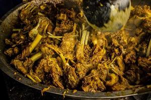 tengkleng kambing or goat tengkleng is a kind of soup with the main ingredient of goat bones. tengkleng like curry with goat bone material photo