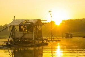 keramba ikan, fish farming in lake. keramba ikan is traditional fish cages, traditional aquaculture farm in indonesia photo