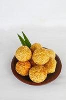 onde-onde or sesame ball or Jian Dui is fried Chinese pastry made from glutinous rice flour and coated with sesame seeds filled with bean paste. isolated on white background photo