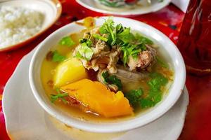 sop buntut or oxtail soup or tail soup is traditional soup made from tail ox, Boiled with Spices photo