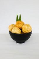 onde-onde or sesame ball or Jian Dui is fried Chinese pastry made from glutinous rice flour and coated with sesame seeds filled with bean paste. isolated on white background photo