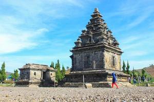 Local tourists visit Arjuna temple complex at Dieng Plateau after the covid 19 emergency response period photo