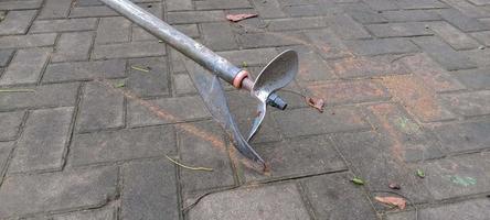 Propeller and rudder of little boat photo