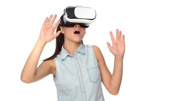 Young woman in virtual reality VR glasses. photo