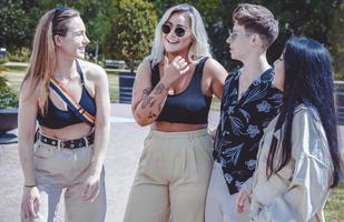 LGBT woman smiling and having fun in the park. photo