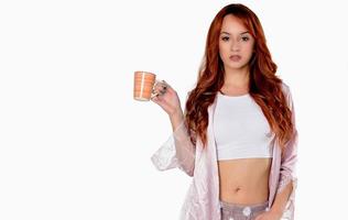 Beautiful woman drinking tea, drinking coffee, studio portrait photo