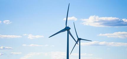 Wind turbines on sunny morning photo