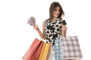 Young Modern Beautiful woman with a lot of shopping bags photo