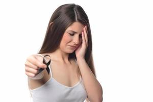 beautiful woman holding black ribbon on white background mourning awareness sign photo