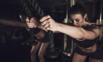 Woman doing a workout at the fitness gym. photo