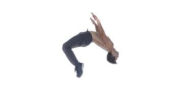 male model doing break dance routine. isolated on white background photo