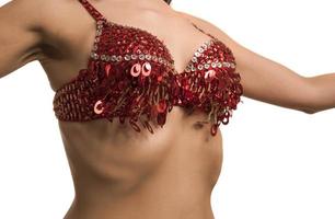 Beautiful belly dancer young woman in gorgeous red and black costume dress photo