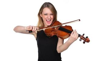 Beautiful natural blond girl playing violin. isolated on white photo