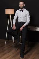 Elegant young handsome man. Studio fashion portrait. photo