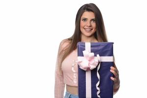 beautiful happy woman holding gift boxes photo