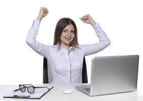 beautiful female model working on a laptop photo