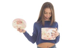 Beautiful woman holding big gift box photo