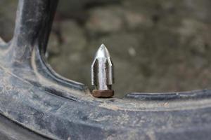válvula de neumático de motocicleta foto