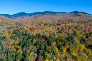 Aerial panoramic view of peak Fall foliage in Stowe, Vermont. photo