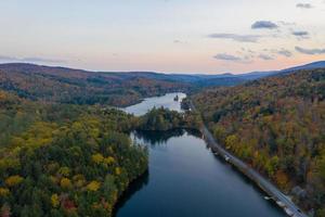 Aerial view of Amherst Lake in fall foliage in Plymouth, Vermont. photo